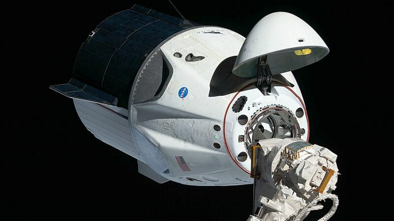 From space station for trip back to Earth, SpaceX Dragon freight transport undocks